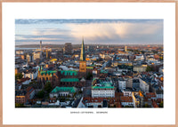 Aarhus set fra luften.Domkirketårnet og midtbyens Irgrønne tage 